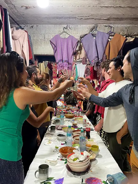 A toast at a Day of the Dead dinner with the Co404 community